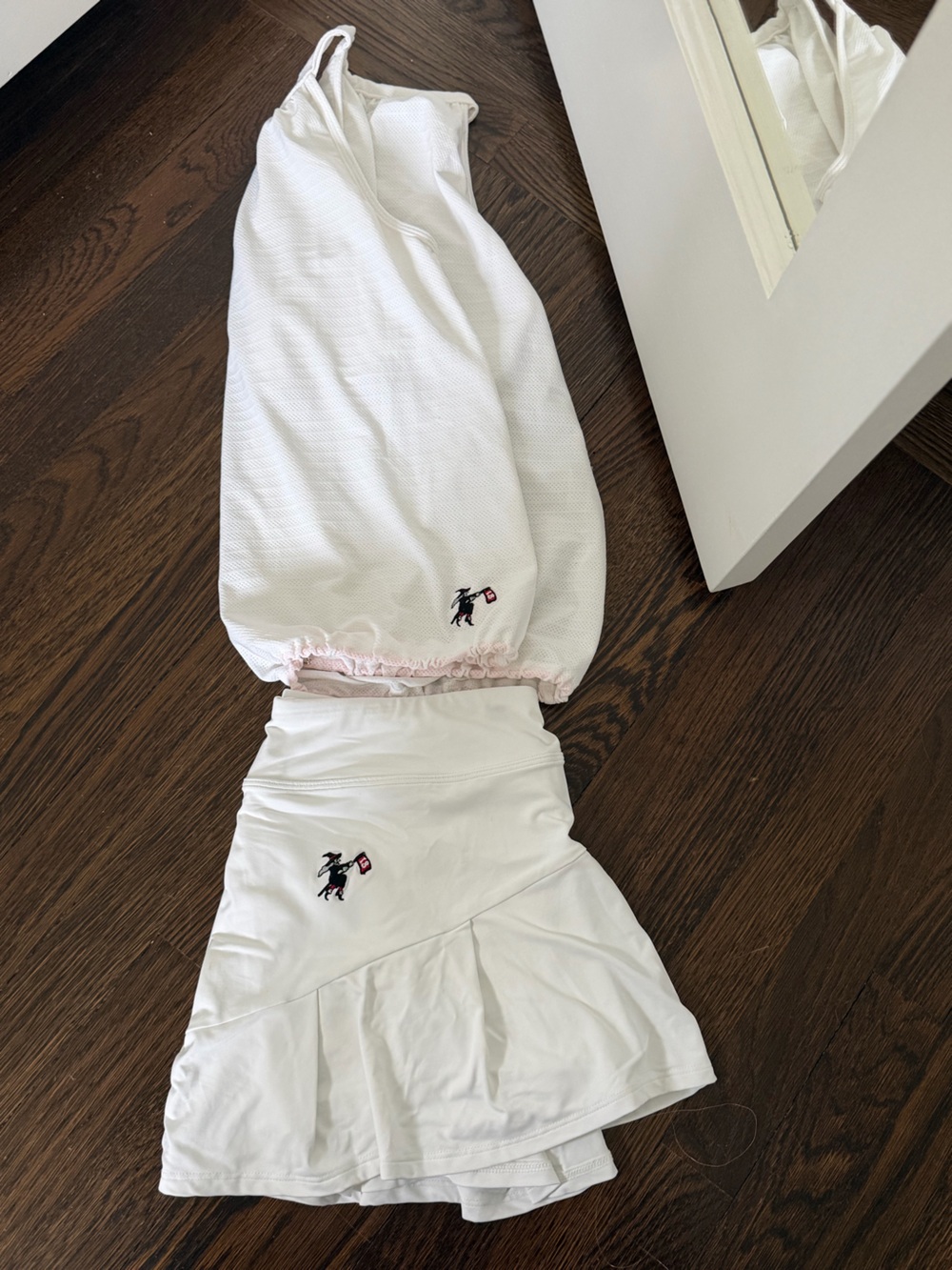 White Women's Two-Piece Tennis Set - Sleeveless Top & Skort